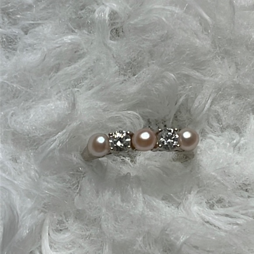 Avon, Sterling silver ring, with real pearls and CZ. Size small 6.